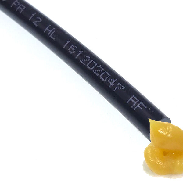100-009 - Plastic tube - Ø 6 x 1,5 mm - nominal pressure 89 bar - filled firh grease NLGI Cl. II - semi rigid - price per meter
